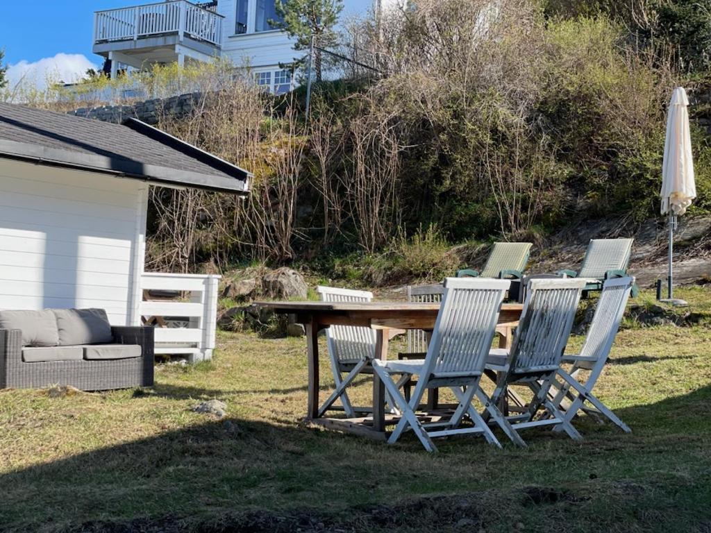 With1 Bedroom Separate Living With A Sofa Bed And A Tiny Kitchen A Bathroom Located In Nordstrand Near By The Sea For 3 Guests With A Garden And Grill 5 Extra Guests With Extra Cost In The With Sea View Just Outside The Apar